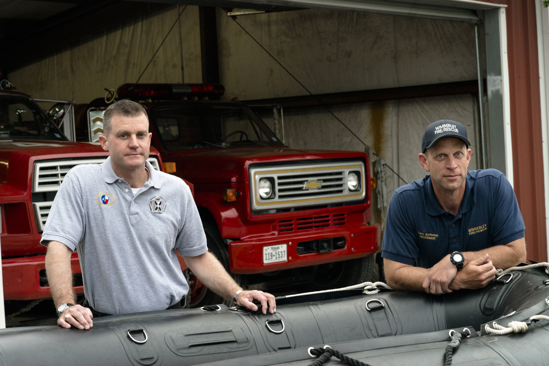 Wimberley volunteer firefighters Lieutenant Travis Maher (left) and Lynn Burttschell.